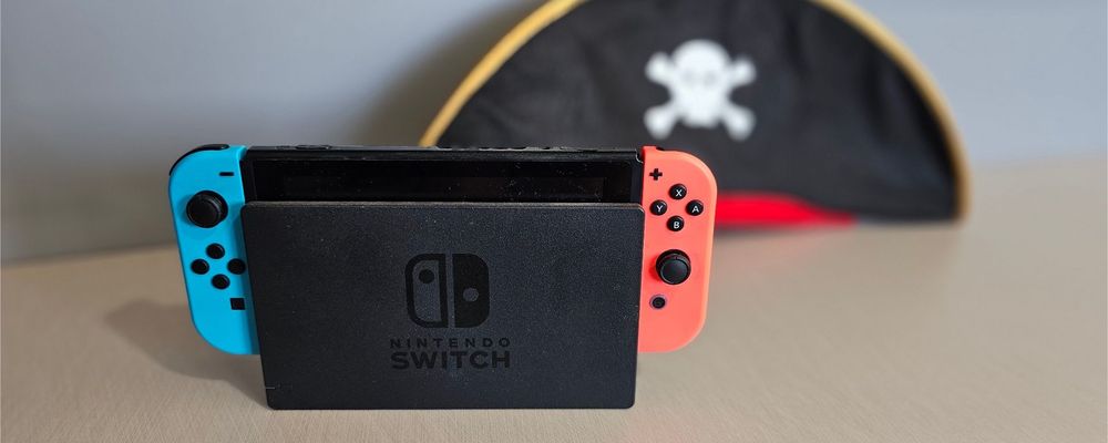 montagem com o Nintendo Switch e o logo da Nintendo em destaque