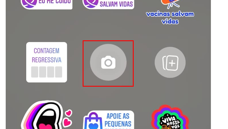 Procure o sticker de câmera